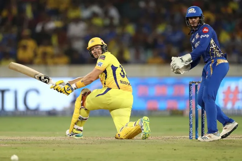 Cricket commentators in broadcast booth